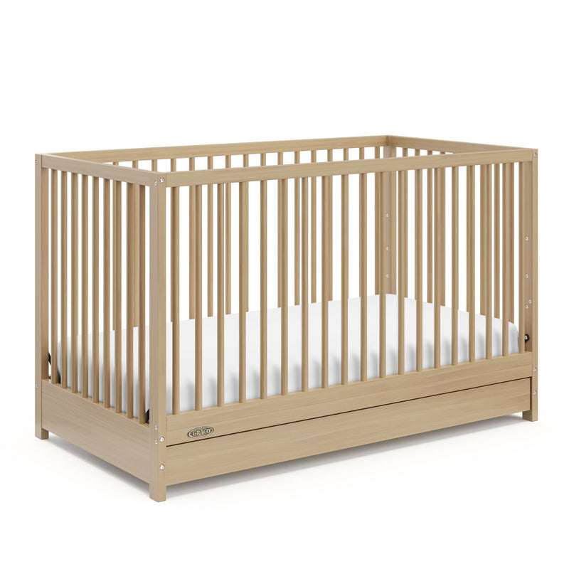 Graco Teddi 4-in-1 Convertible Crib with Drawer, Driftwood J3